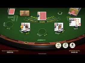 Una mesa de Premium blackjack iniciando la acción en el casino Betsson. Las apuestas están sobre la mesa y las cartas han sido repartidas.
