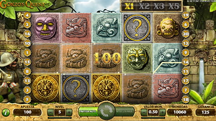 Tablero de la tragaperras Gonzo's Quest con una combinación ganadora y el número cien en dorado en el medio.